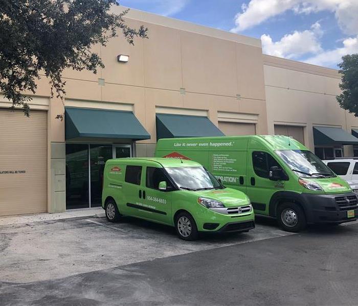 SERVPRO cars parked at office.